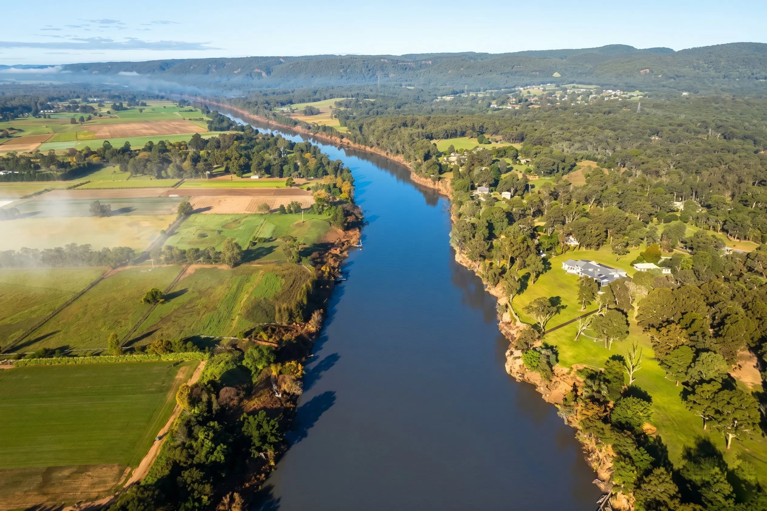 Aerial view of a river winding through regional New South Wales farmland and bushland